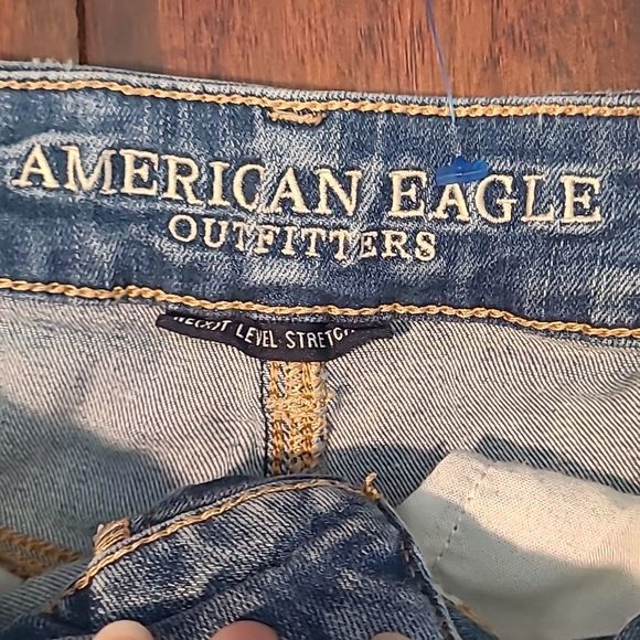 American Eagle Mini Jean Skirt Distressed Worn Denim Frayed Hem Mid Wash Pockets - Picture 8 of 16